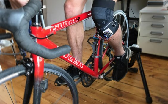 A model tests a mockup of the knee sleeve