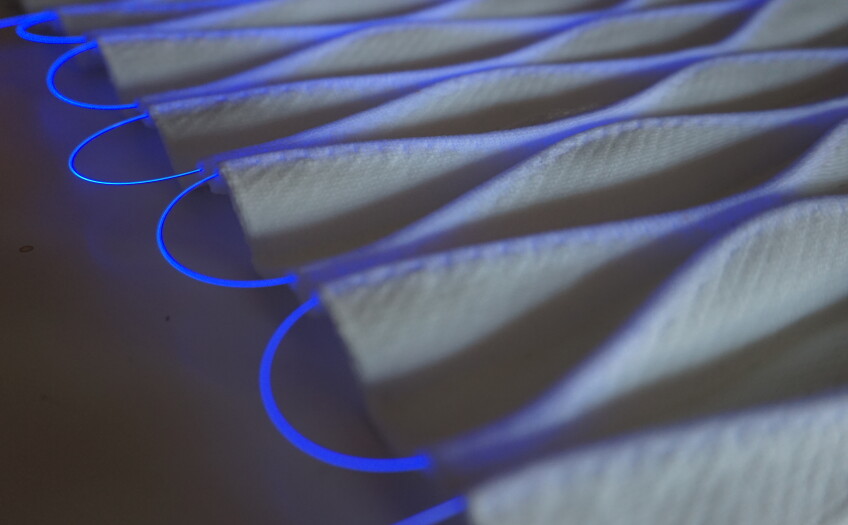 fibers of blue light in a 3D smart knit textile