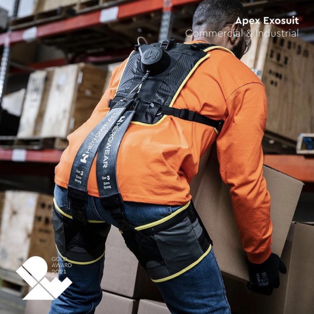 a warehouse worker wears the Apex Exosuit