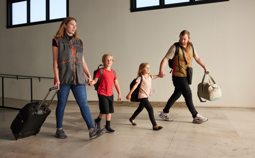 Perci Emergency Preparedness Vest by INVICTA Ready on a family