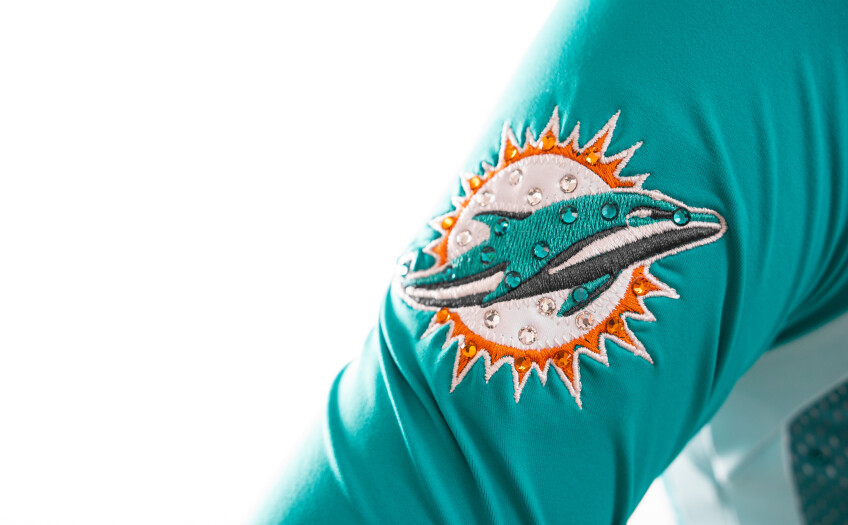 Miami Dolphins logo on a cheer uniform