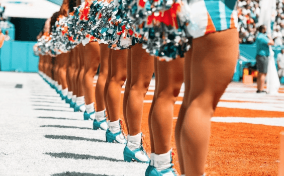 Miami Dolphins cheerleaders in a line with new uniforms