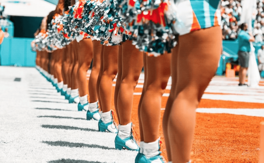 Miami Dolphins cheerleaders in a line with new uniforms