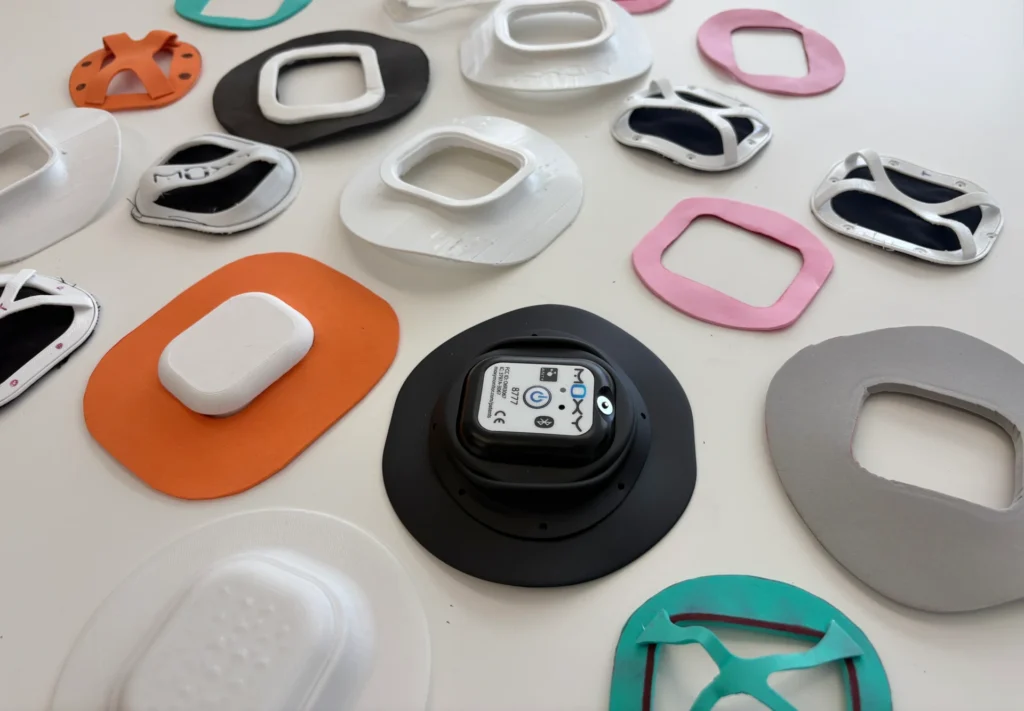 Design iterations of Moxy Monitor sensor light shield and mounting ring components