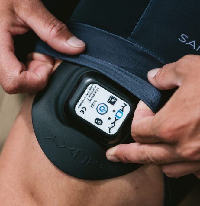 Athlete wearing Moxy Monitor sensor during field performance testing