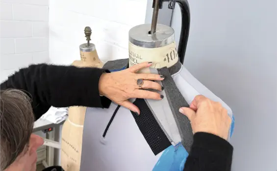 Smart garment construction showing integrated electronics within garment structure