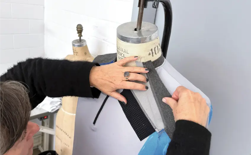 Smart garment construction showing integrated electronics within garment structure