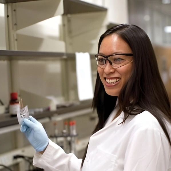Materials scientist Candace Chan working in a lab on flexible battery research for wearable technology